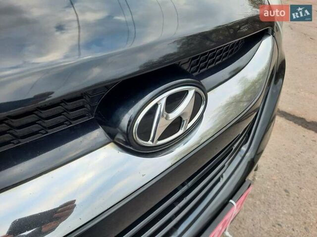 Чорний Хендай іх35, об'ємом двигуна 2 л та пробігом 211 тис. км за 12700 $, фото 28 на Automoto.ua