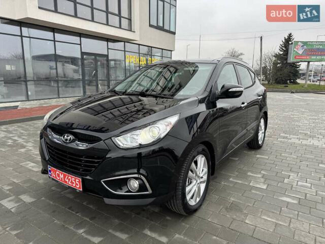 Черный Хендай их35, объемом двигателя 2 л и пробегом 177 тыс. км за 11999 $, фото 3 на Automoto.ua