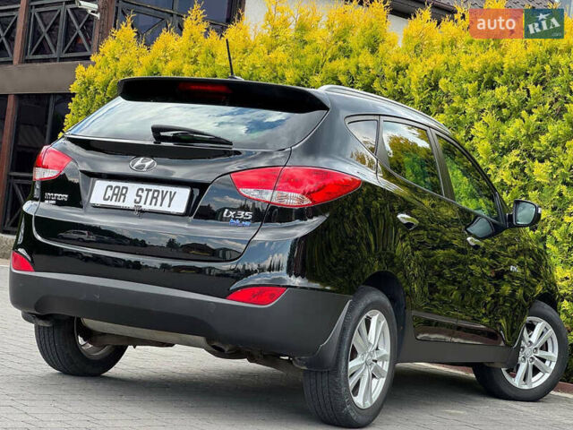Черный Хендай их35, объемом двигателя 1.69 л и пробегом 238 тыс. км за 11999 $, фото 17 на Automoto.ua