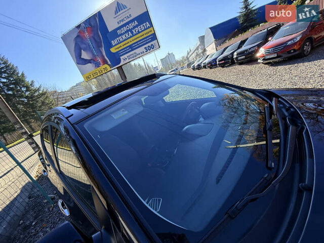 Чорний Хендай іх35, об'ємом двигуна 2 л та пробігом 153 тис. км за 13999 $, фото 11 на Automoto.ua