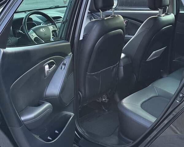 Чорний Хендай іх35, об'ємом двигуна 2 л та пробігом 173 тис. км за 13800 $, фото 20 на Automoto.ua