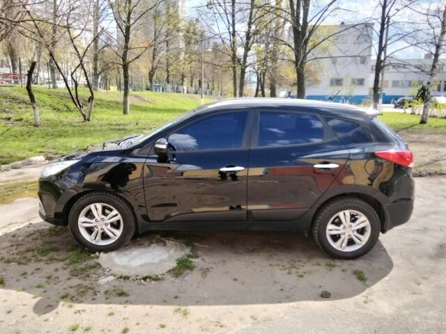 Чорний Хендай іх35, об'ємом двигуна 2 л та пробігом 180 тис. км за 12999 $, фото 7 на Automoto.ua