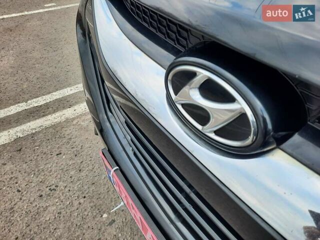 Чорний Хендай іх35, об'ємом двигуна 2 л та пробігом 211 тис. км за 12700 $, фото 27 на Automoto.ua