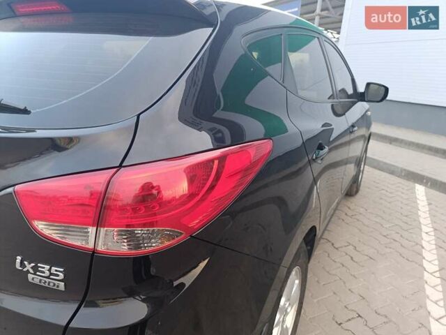 Чорний Хендай іх35, об'ємом двигуна 1.7 л та пробігом 257 тис. км за 11850 $, фото 7 на Automoto.ua