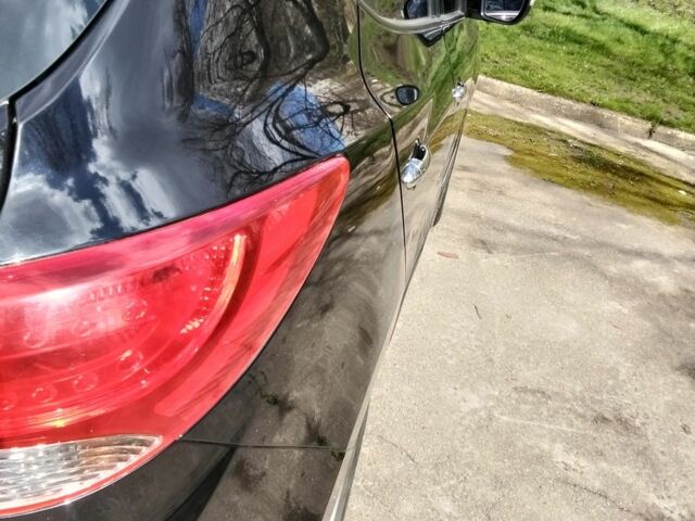 Чорний Хендай іх35, об'ємом двигуна 2 л та пробігом 180 тис. км за 12999 $, фото 13 на Automoto.ua