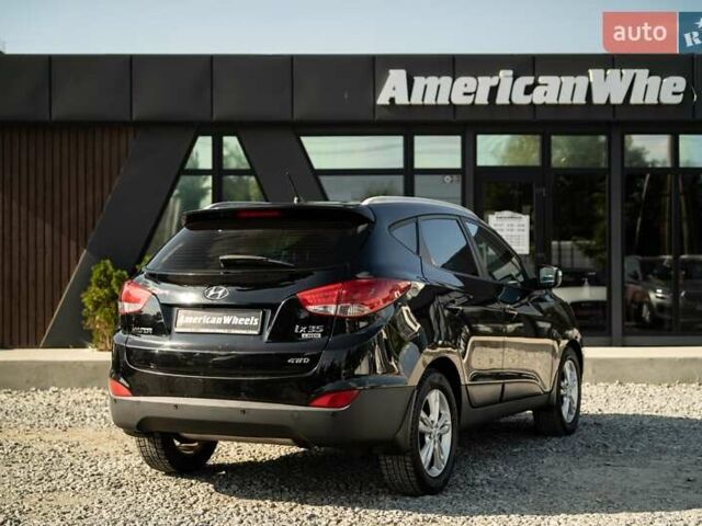 Черный Хендай их35, объемом двигателя 2 л и пробегом 147 тыс. км за 15200 $, фото 4 на Automoto.ua
