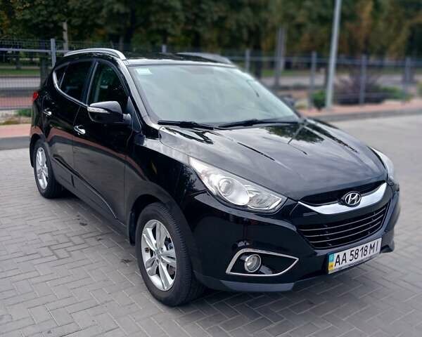Чорний Хендай іх35, об'ємом двигуна 2 л та пробігом 189 тис. км за 12200 $, фото 6 на Automoto.ua