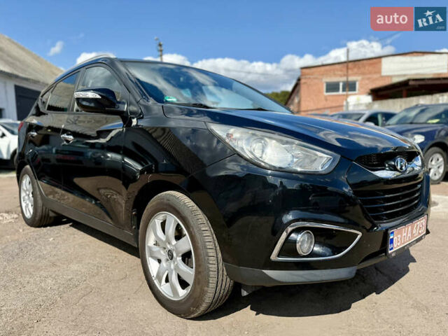 Чорний Хендай іх35, об'ємом двигуна 2 л та пробігом 253 тис. км за 13000 $, фото 14 на Automoto.ua