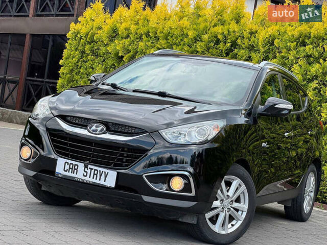 Черный Хендай их35, объемом двигателя 1.69 л и пробегом 238 тыс. км за 11999 $, фото 12 на Automoto.ua