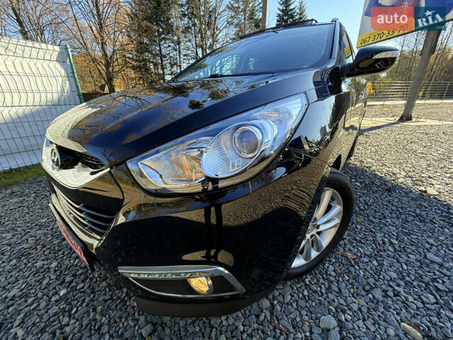 Чорний Хендай іх35, об'ємом двигуна 2 л та пробігом 153 тис. км за 13999 $, фото 5 на Automoto.ua