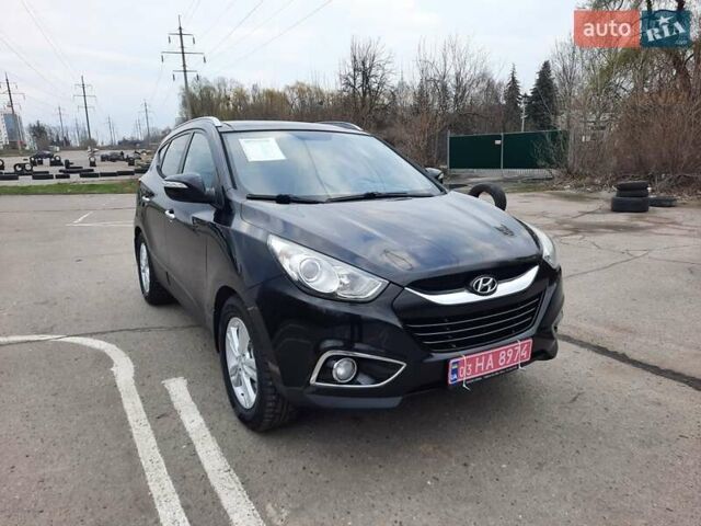 Чорний Хендай іх35, об'ємом двигуна 2 л та пробігом 211 тис. км за 12700 $, фото 1 на Automoto.ua