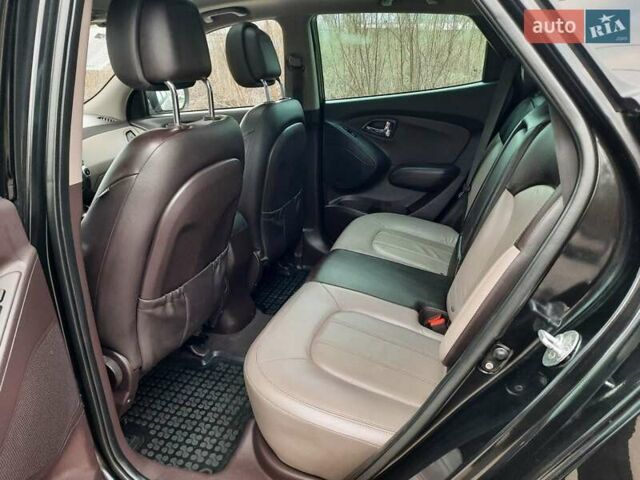 Чорний Хендай іх35, об'ємом двигуна 2 л та пробігом 211 тис. км за 12700 $, фото 74 на Automoto.ua