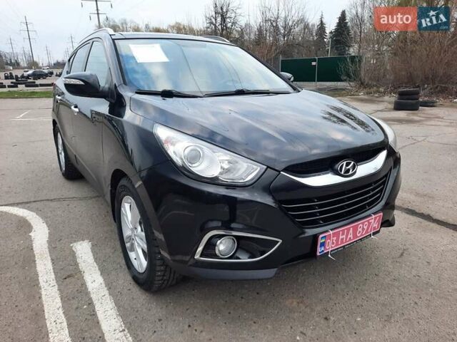 Чорний Хендай іх35, об'ємом двигуна 2 л та пробігом 211 тис. км за 12700 $, фото 117 на Automoto.ua