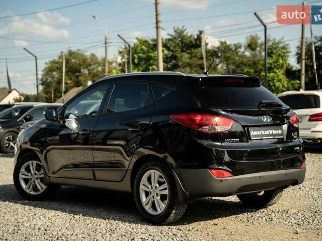 Черный Хендай их35, объемом двигателя 2 л и пробегом 147 тыс. км за 15200 $, фото 6 на Automoto.ua