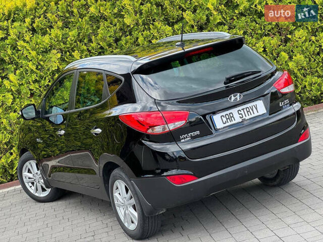 Черный Хендай их35, объемом двигателя 1.69 л и пробегом 238 тыс. км за 11999 $, фото 24 на Automoto.ua