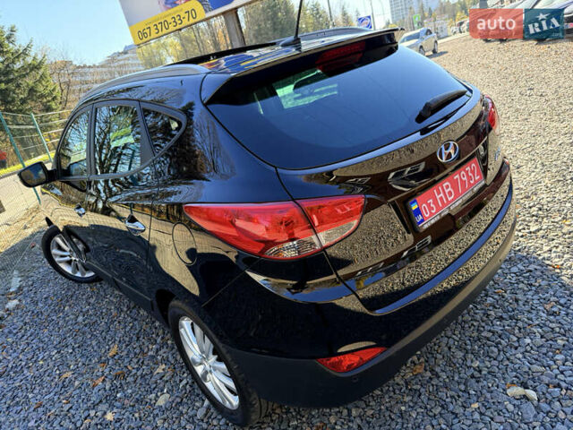 Чорний Хендай іх35, об'ємом двигуна 2 л та пробігом 153 тис. км за 13999 $, фото 21 на Automoto.ua