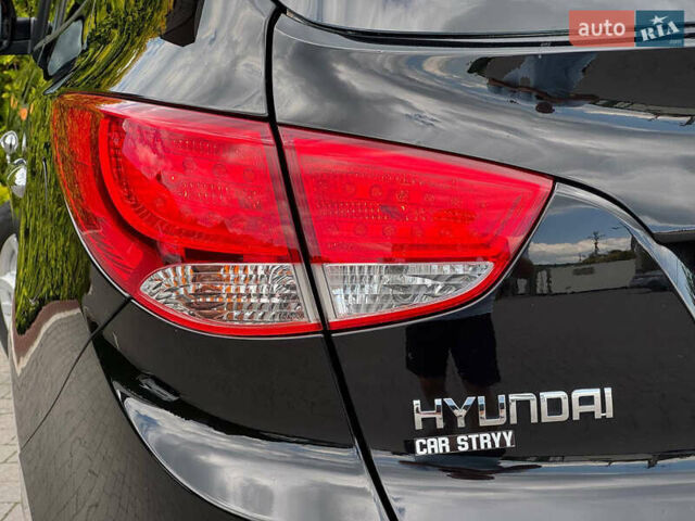 Черный Хендай их35, объемом двигателя 1.69 л и пробегом 238 тыс. км за 11999 $, фото 23 на Automoto.ua