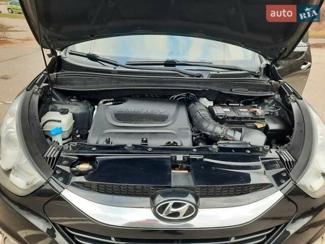 Чорний Хендай іх35, об'ємом двигуна 2 л та пробігом 211 тис. км за 12700 $, фото 119 на Automoto.ua