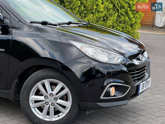 Черный Хендай их35, объемом двигателя 1.69 л и пробегом 238 тыс. км за 11999 $, фото 7 на Automoto.ua