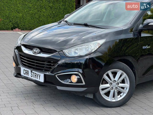 Черный Хендай их35, объемом двигателя 1.69 л и пробегом 238 тыс. км за 11999 $, фото 13 на Automoto.ua