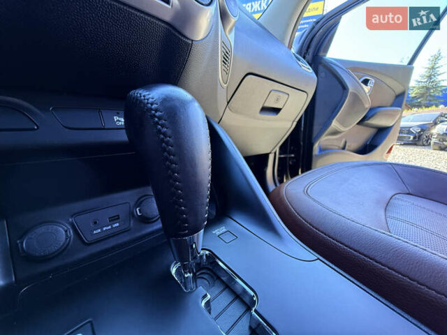 Чорний Хендай іх35, об'ємом двигуна 2 л та пробігом 153 тис. км за 13999 $, фото 46 на Automoto.ua