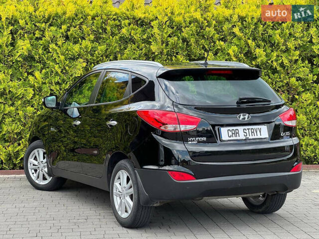 Черный Хендай их35, объемом двигателя 1.69 л и пробегом 238 тыс. км за 11999 $, фото 3 на Automoto.ua