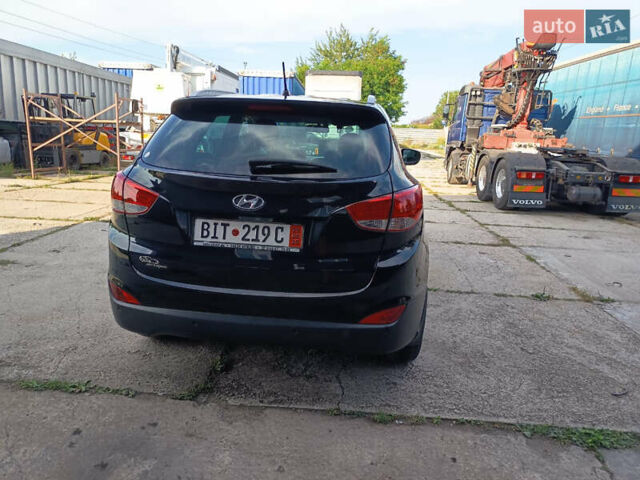 Черный Хендай их35, объемом двигателя 2 л и пробегом 195 тыс. км за 12600 $, фото 6 на Automoto.ua