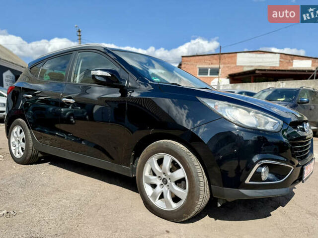 Чорний Хендай іх35, об'ємом двигуна 2 л та пробігом 253 тис. км за 13000 $, фото 1 на Automoto.ua