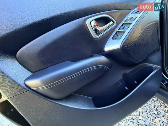 Чорний Хендай іх35, об'ємом двигуна 2 л та пробігом 153 тис. км за 13999 $, фото 35 на Automoto.ua