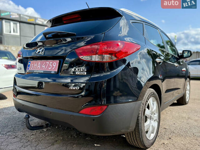 Чорний Хендай іх35, об'ємом двигуна 2 л та пробігом 253 тис. км за 13000 $, фото 6 на Automoto.ua