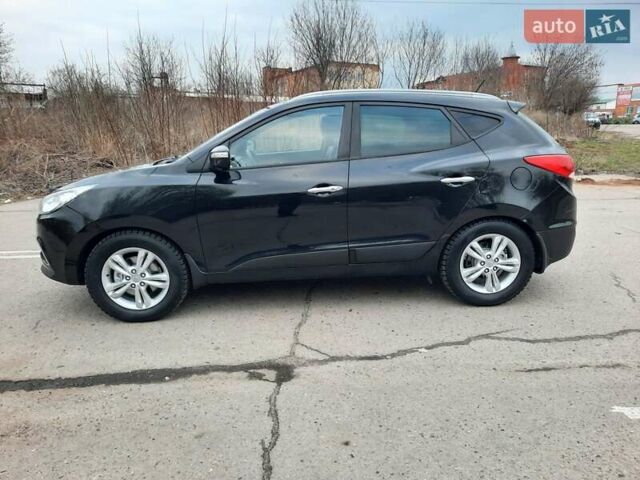 Чорний Хендай іх35, об'ємом двигуна 2 л та пробігом 211 тис. км за 12700 $, фото 10 на Automoto.ua