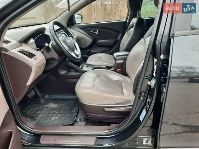 Чорний Хендай іх35, об'ємом двигуна 2 л та пробігом 211 тис. км за 12700 $, фото 35 на Automoto.ua