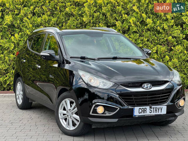 Черный Хендай их35, объемом двигателя 1.69 л и пробегом 238 тыс. км за 11999 $, фото 6 на Automoto.ua