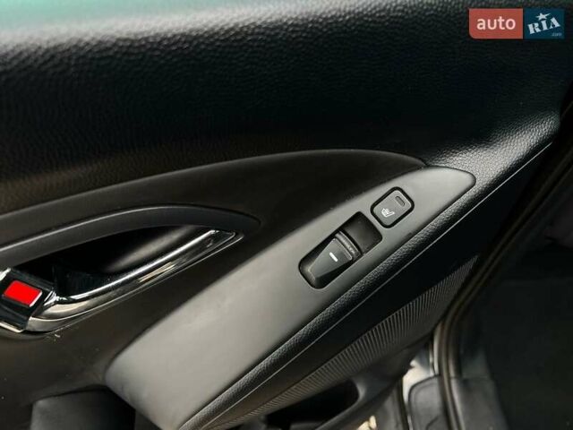 Чорний Хендай іх35, об'ємом двигуна 2 л та пробігом 195 тис. км за 12800 $, фото 13 на Automoto.ua