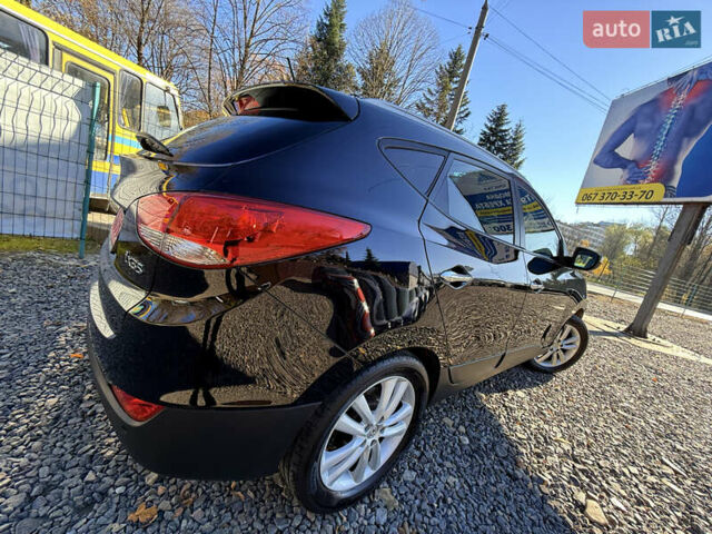 Чорний Хендай іх35, об'ємом двигуна 2 л та пробігом 153 тис. км за 13999 $, фото 13 на Automoto.ua