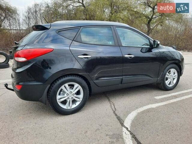 Чорний Хендай іх35, об'ємом двигуна 2 л та пробігом 211 тис. км за 12700 $, фото 17 на Automoto.ua