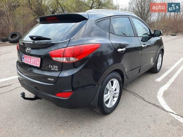 Чорний Хендай іх35, об'ємом двигуна 2 л та пробігом 211 тис. км за 12700 $, фото 90 на Automoto.ua