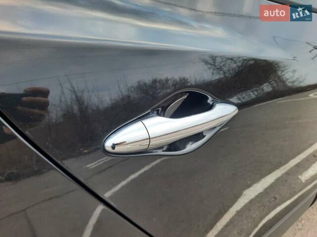 Чорний Хендай іх35, об'ємом двигуна 2 л та пробігом 211 тис. км за 12700 $, фото 95 на Automoto.ua