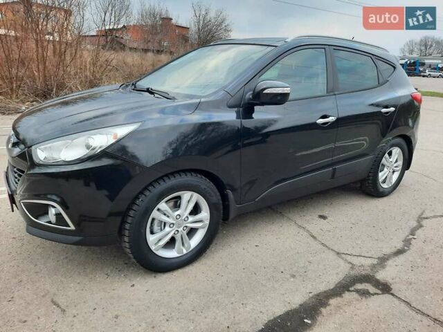 Чорний Хендай іх35, об'ємом двигуна 2 л та пробігом 211 тис. км за 12700 $, фото 122 на Automoto.ua