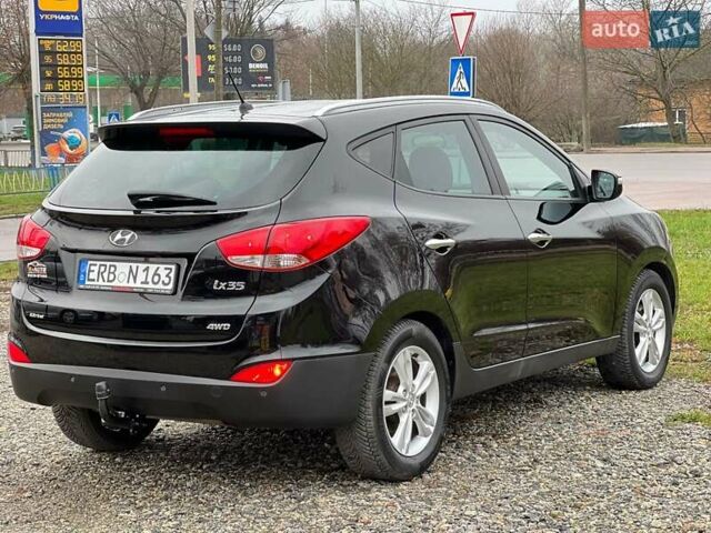 Чорний Хендай іх35, об'ємом двигуна 2 л та пробігом 195 тис. км за 12800 $, фото 12 на Automoto.ua
