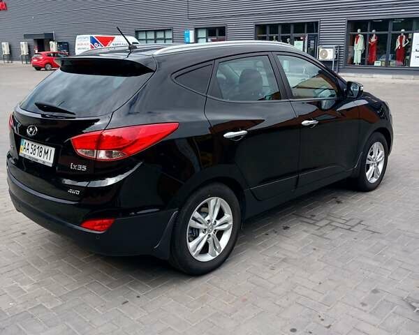 Чорний Хендай іх35, об'ємом двигуна 2 л та пробігом 189 тис. км за 12200 $, фото 9 на Automoto.ua