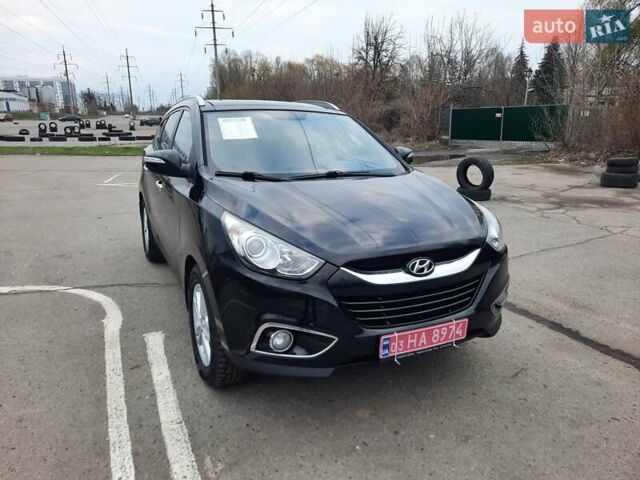 Чорний Хендай іх35, об'ємом двигуна 2 л та пробігом 211 тис. км за 12700 $, фото 2 на Automoto.ua