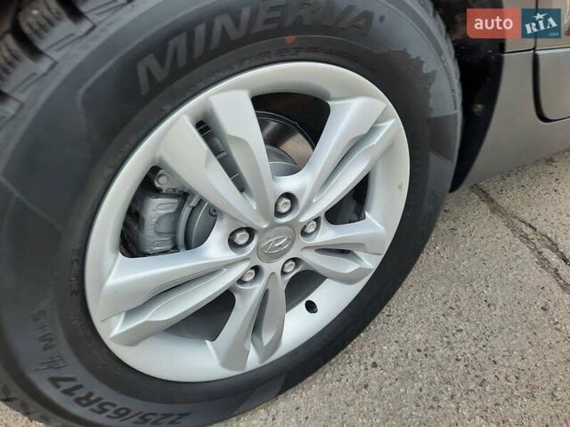 Чорний Хендай іх35, об'ємом двигуна 2 л та пробігом 211 тис. км за 12700 $, фото 94 на Automoto.ua