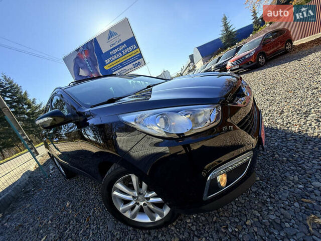 Чорний Хендай іх35, об'ємом двигуна 2 л та пробігом 153 тис. км за 13999 $, фото 7 на Automoto.ua
