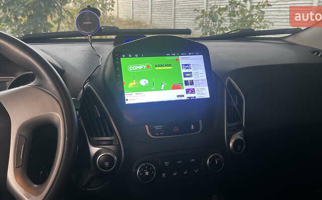 Чорний Хендай іх35, об'ємом двигуна 2 л та пробігом 148 тис. км за 12800 $, фото 1 на Automoto.ua