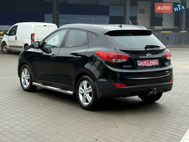 Черный Хендай их35, объемом двигателя 2 л и пробегом 230 тыс. км за 11850 $, фото 10 на Automoto.ua