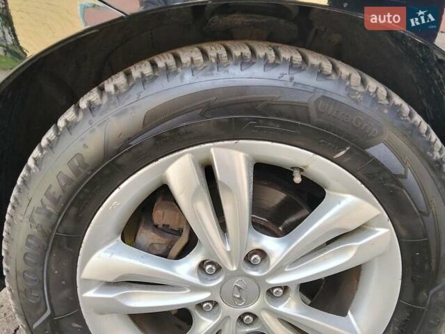 Чорний Хендай іх35, об'ємом двигуна 2 л та пробігом 180 тис. км за 12999 $, фото 15 на Automoto.ua