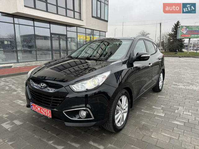 Черный Хендай их35, объемом двигателя 2 л и пробегом 177 тыс. км за 11999 $, фото 4 на Automoto.ua
