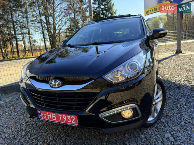 Чорний Хендай іх35, об'ємом двигуна 2 л та пробігом 153 тис. км за 13999 $, фото 1 на Automoto.ua
