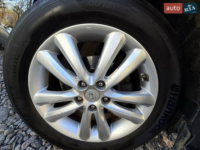 Чорний Хендай іх35, об'ємом двигуна 2 л та пробігом 153 тис. км за 13999 $, фото 10 на Automoto.ua